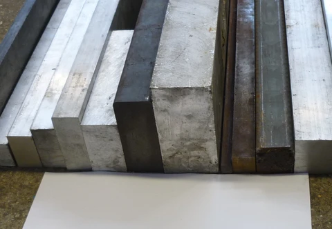 Rectangular metal bar stock with square corners and cut end faces