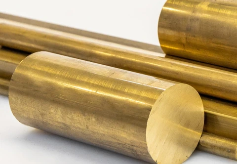 Long brass rods of several diameters with their ends visible