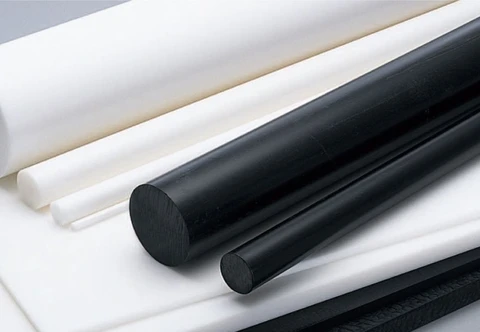 Long white and black polymer bars extending diagonally across the frame
