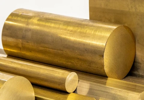 A solid brass cylinder with a circular cut face and visible machining lines