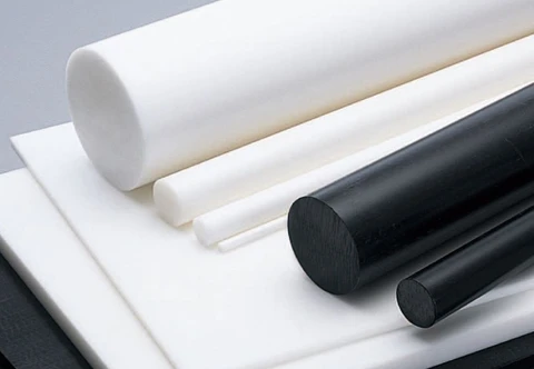 White and black polymer round stock with solid circular ends