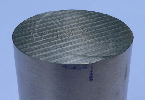 Cylindrical Inconel stock with a visible cut end face