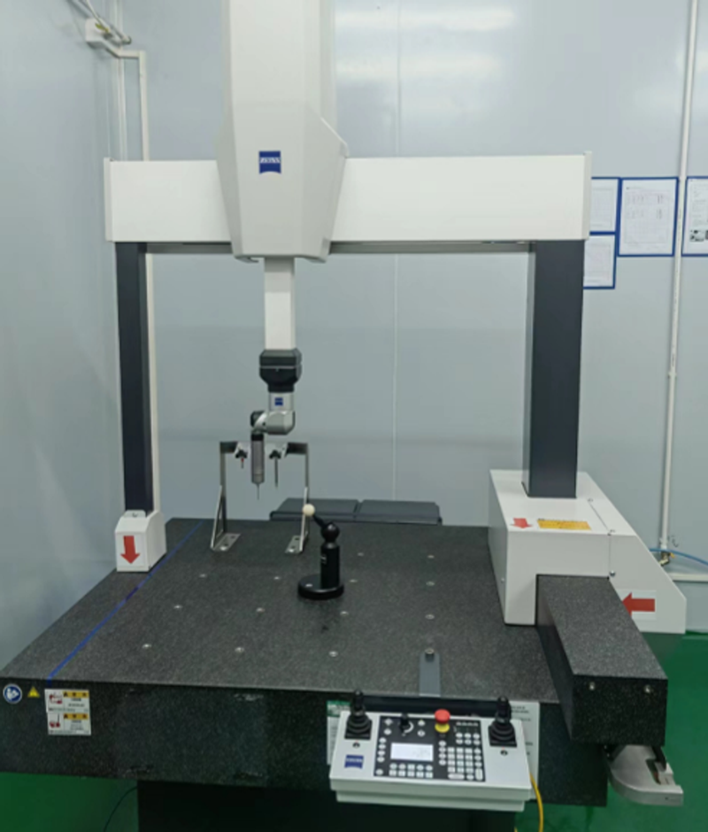 ZEISS coordinate measuring machine with a probe and granite measuring table in the factory measurement room