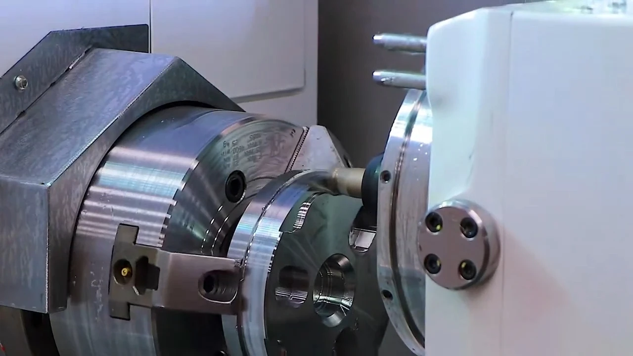 Mill-turn machining of a metal flange held in a chuck
